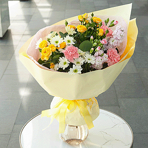 Spray rose: yellow, orange 50 cm - 3, Pink Matthiola - 2, Pink carnation - 5, Bacardi White Spray Chrysanthemum - 2, Pink spray carnation - 3, Eucalyptus populus (1 pc.), Wrapping Paper