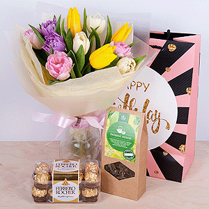 Gift set "Tulips, chocolate sweets and tea" with delivery Volzhskiy