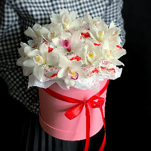 Arrangement "Orchid and Candy" with delivery Saint Petersburg