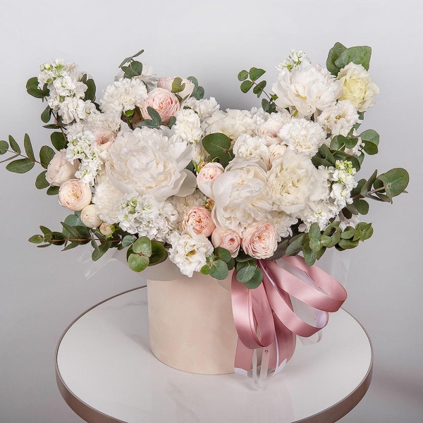 Peony white - 3, Baltica White Spray Chrysanthemum - 4, Peony sprayrose - 4, White Matthiola - 9, Carnation white, cream - 15, lisianthus - 5, Round flower box medium, Oasis, Eucalyptus, Ribbon