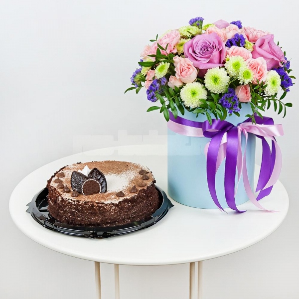 Deep Purple rose - 5, Santini White Spray Chrysanthemum - 5, Pink carnation - 5, Bright pink spray rose mix, 50 cm - 8, Round flower box small , Oasis, Pistachio, Film, Blue Statice, Ribbon, Cake in assortment