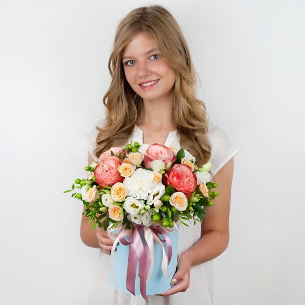 Spray rose: white, cream, light pink 50 cm - 7, Carnation white, cream - 5, lisianthus - 5, Peony rose Kahala 50 cm - 7, Round flower box small , Oasis, Film, Pistachio, Ruscus, Hypericum, Ribbon