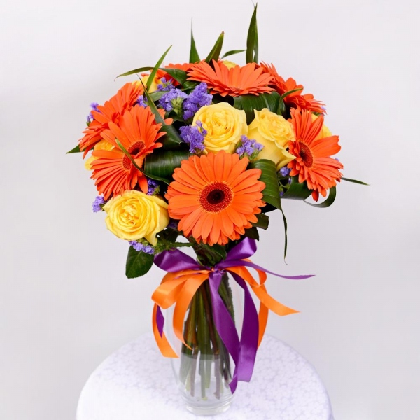 Gerbera daisies - 10, Yellow rose 50 cm - 11, Aspidistra (1 pc.), Blue Statice, Ribbon, Ribbon