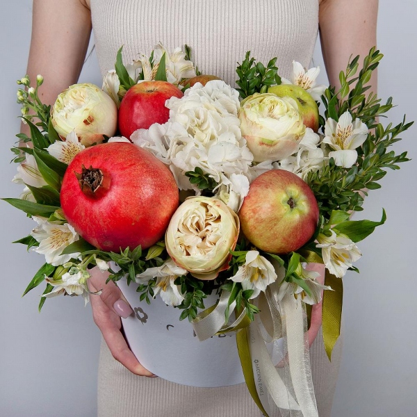 Peony style roses - 3,  White Hydrangea - 1, Alstromeria white, soft pink - 7, White Matthiola - 1, Pistachio, Apple, 1 pc., Pomegranate, Round flower box medium, Oasis, Ribbon, Wooden skewer