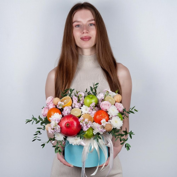 Baltica White Spray Chrysanthemum - 2, Matthiola Lilac - 7, Peony sprayrose - 2, Round flower box medium, Oasis, Eucalyptus, Apple, 1 pc., Lemon, 1 pc., Tangerine, 1 pc., Walnut (10 pieces), Pomegranate, Wooden skewer, Wrapping Paper