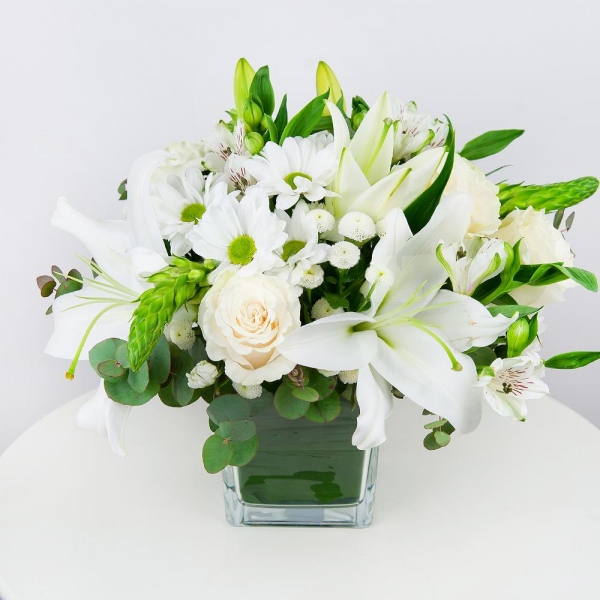 Lilies - 1, White rose 50 cm - 5, Bacardi White Spray Chrysanthemum - 2, Alstromeria white, soft pink - 3, Santini White Spray Chrysanthemum - 2, Transparent vase, Oasis, Ornithogalum, Eucalyptus Cinerea
