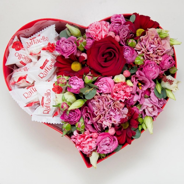 Red rose 50 cm - 3, Bright pink spray rose mix, 50 cm - 3, Pink carnation - 3, Pink spray carnation - 3, Pink Lisianthus (Eustoma) - 2, Bacardi Red Spray Chrysanthemum - 3, Heart‑shaped box for arrangements, Oasis, Film, Box of candies «Raffaello» 150 g, Hypericum, Eucalyptus Cinerea
