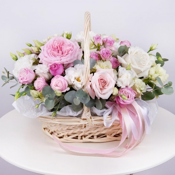 Peony rose pink 'OHara' - 1, White rose 50 cm - 3, Pink rose 50 cm - 3, Bright pink spray rose mix, 50 cm - 6, Carnation white, cream - 3, lisianthus - 3, Medium Basket, Oasis, Eucalyptus Cinerea, Ribbon