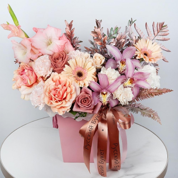 Rose Pink 50 cm Ecuador (Chelo, Hermosa, Novia, Titanik, Engagement, Pink Mondiale) - 6, Carnation white, cream - 10, Pink Gladiolus - 2, Pink Cymbidium Orchid Bud - 3, Gerbera pink - 4, Spray rose: white, cream, light pink 50 cm - 1, Flask for orchids, Fern (1 pc.), Pistachio, Composition Box, Oasis, Ribbon