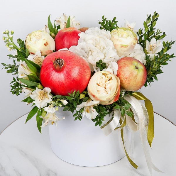 Peony style roses - 3,  White Hydrangea - 1, Alstromeria white, soft pink - 7, White Matthiola - 1, Pistachio, Apple, 1 pc., Pomegranate, Round flower box medium, Oasis, Ribbon, Wooden skewer