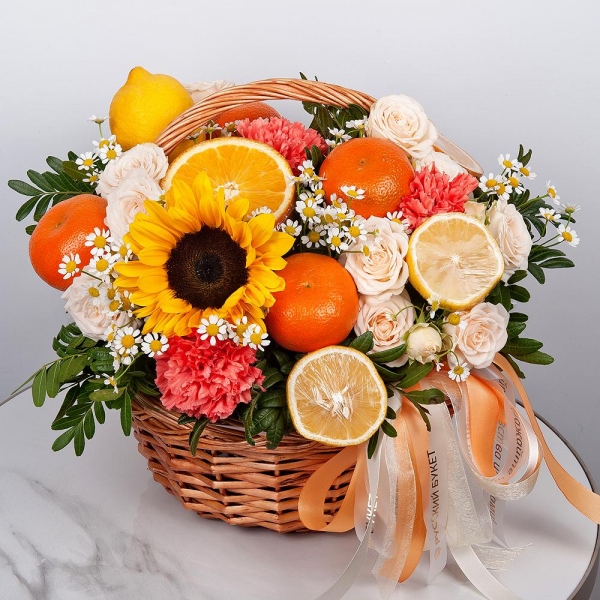 Peony sprayrose - 5, Sunflower - 1, Chamomile - 4, Pink carnation - 7, Small Basket, Oasis, Wrapping Paper, Pistachio, Orange, Tangerine, 1 pc., Lemon, 1 pc., Wooden skewer