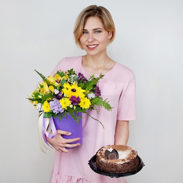 Gerbera yellow - 2, Lilac carnation - 3, Orchid bud yellow/brown Cymbidium - 3, Alstromeria lilac, purple - 2, Bacardi Yellow Spray Chrysanthemum - 3, Alstromeria Yellow, Orange - 1, Purple Lisianthus (Eustoma) - 6, Round flower box small , Film, Oasis, Pistachio, Ruscus, Ambrella, Flask for orchids, Ribbon, Cake in assortment