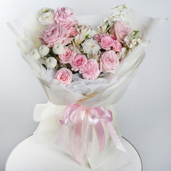 Ranunculus White - 1, Peony rose pink 'OHara' - 3, White Matthiola - 2, Bright pink spray rose mix, 50 cm - 3, Pink carnation - 11, Alstromeria white, soft pink - 6, Newton White Spray Chrysanthemum - 1, Baltica White Spray Chrysanthemum - 1, Ozotamnus, Wrapping Paper