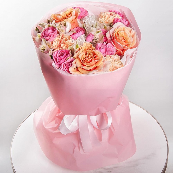 Pink-orange rose Phoenix 50 cm - 3, Bright pink spray rose mix, 50 cm - 3, Baltica White Spray Chrysanthemum - 1, Carnation white, cream - 5, Alstromeria white, soft pink - 4, Wrapping Paper