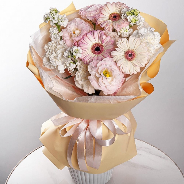 Gerbera pink - 7, Pink Lisianthus (Eustoma) - 2, Carnation white, cream - 7, Baltica White Spray Chrysanthemum - 1, Wrapping Paper