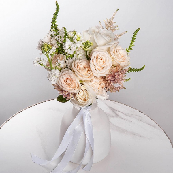 White rose 50 cm Ecuador - 3, Peony sprayrose - 2, White Matthiola - 3, Carnation white, cream - 11, Veronica spray, Astilbe, Ribbon
