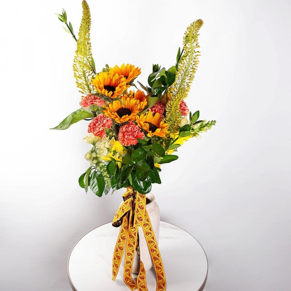 Sunflower - 5, Pink carnation - 11, White Matthiola - 7, White Delphinium - 3, Pittosporum, Ribbon