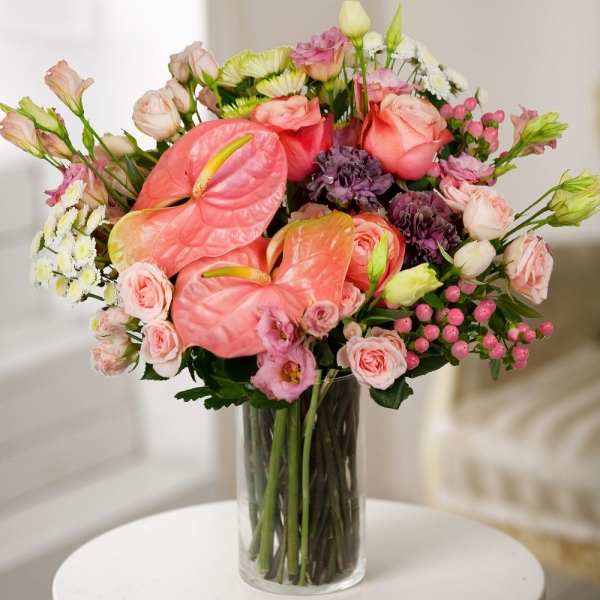 Pink Lisianthus (Eustoma) - 4, Athos poms Stallion - 4, Lilac carnation - 3, Bright pink spray rose mix, 50 cm - 8, Pink cut anthurium - 2, Peony rose Kahala 50 cm - 5, Hypericum, Aspidistra (1 pc.), Wrapping Paper