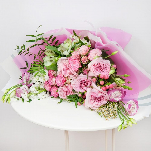 Peony rose pink 'OHara' - 7, Pink Lisianthus (Eustoma) - 3, Spray rose: white, cream, light pink 50 cm - 3, Alstromeria white, soft pink - 3, White Matthiola - 3, Hypericum, Waxflower (1 pc.), Wrapping Paper, Pistachio