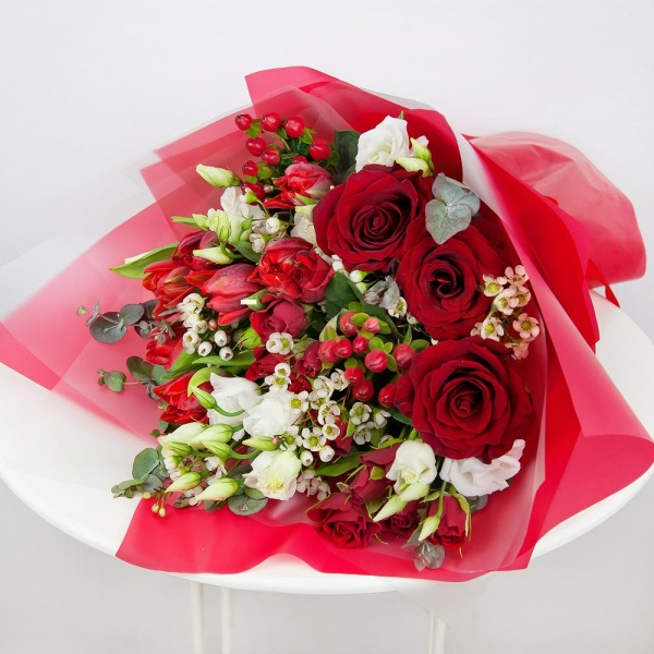 Red rose 50 cm - 4, lisianthus - 3, Spray rose: red 50 cm - 3, Red tulip - 9, Waxflower (1 pc.), Hypericum, Eucalyptus Cinerea, Wrapping Paper