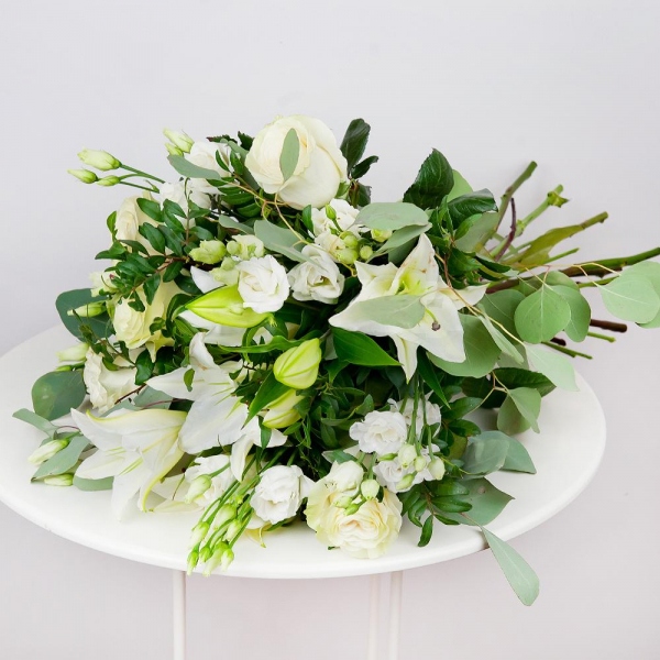 Lilies - 3, White rose 50 cm - 7, lisianthus - 4, Pistachio, Eucalyptus populus (1 pc.), Ribbon