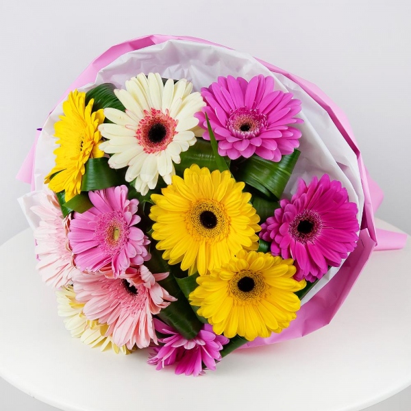 Gerbera white - 4, Gerbera yellow - 4, Gerbera pink - 7, Aspidistra (1 pc.), Wrapping Paper, Ribbon