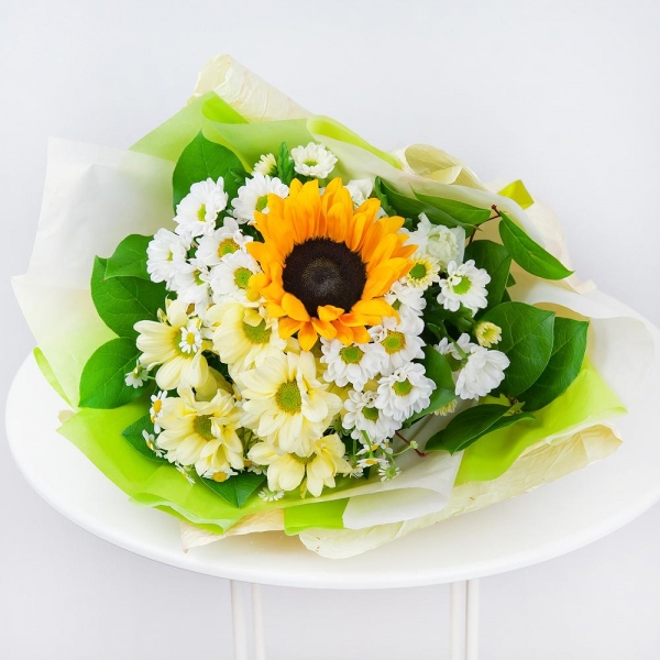 Sunflower - 2, Bacardi Yellow Spray Chrysanthemum - 2, Santini White Spray Chrysanthemum - 3, Chamomile - 2, Salal, Wrapping Paper, Ribbon