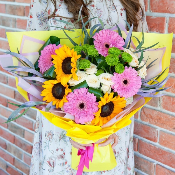 Sunflower - 5, Gerbera pink - 5, Athos pom Feeling Green - 3, Spray rose: white, cream, light pink 50 cm - 3, Aspidistra (1 pc.), Eucalyptus, Wrapping Paper