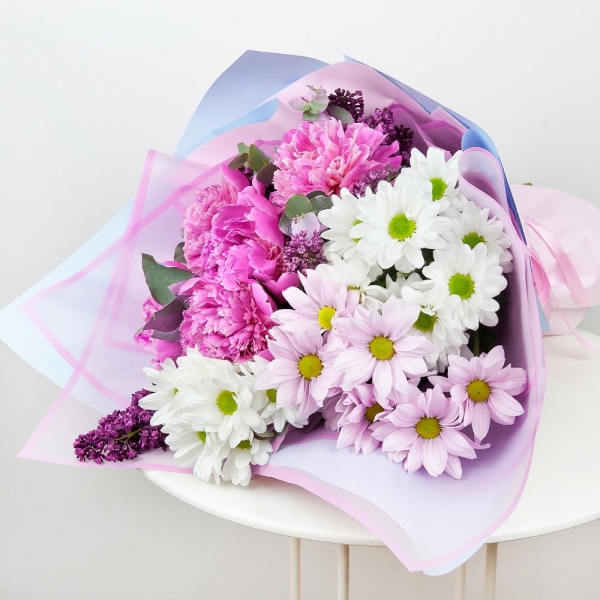 Peony pink - 7, Lilac Bush - 4, Bacardi White Spray Chrysanthemum - 3, Bacardi Pink Spray Chrysanthemum - 1, Wrapping Paper, Ribbon, Eucalyptus