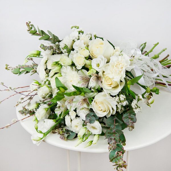 White rose 50 cm - 7, Spray rose: white, cream, light pink 50 cm - 3, Alstromeria white, soft pink - 2, Baltica White Spray Chrysanthemum - 3, Carnation white, cream - 3, lisianthus - 2, White statice, Bunch of willows, Ribbon, Eucalyptus Cinerea