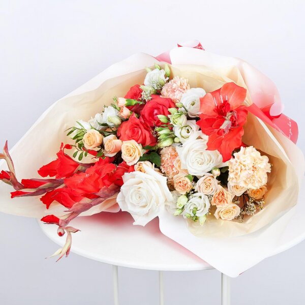 White rose 50 cm - 3, Red rose Nina 50 cm - 3, Spray rose: white, cream, light pink 50 cm - 4, lisianthus - 3, Pink carnation - 4, Red Gladiolus - 4, Limonium (1 pc.), Wrapping Paper