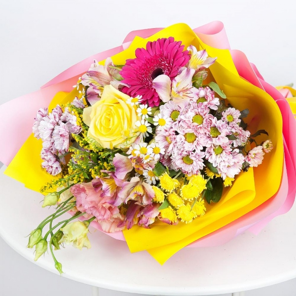Daisy poms Santini pink, purple - 3, Pink Lisianthus (Eustoma) - 2, Yellow rose 50 cm - 2, Purple gerbera - 3, Alstromeria white, soft pink - 3, Athos poms Stallion - 2, Chamomile - 1, Solidago (1 pc.), Wrapping Paper, Ribbon