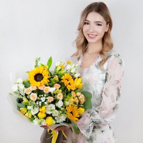 Sunflower - 5, Spray rose: white, cream, light pink 50 cm - 5, lisianthus - 5, Alstromeria Yellow, Orange - 5, Tulip white - 7, White spray carnation - 4, Solidago (1 pc.), Veronica spray, Craspedia, Pistachio, Eucalyptus populus (1 pc.),  Bouvardia, Wrapping Paper, Ribbon