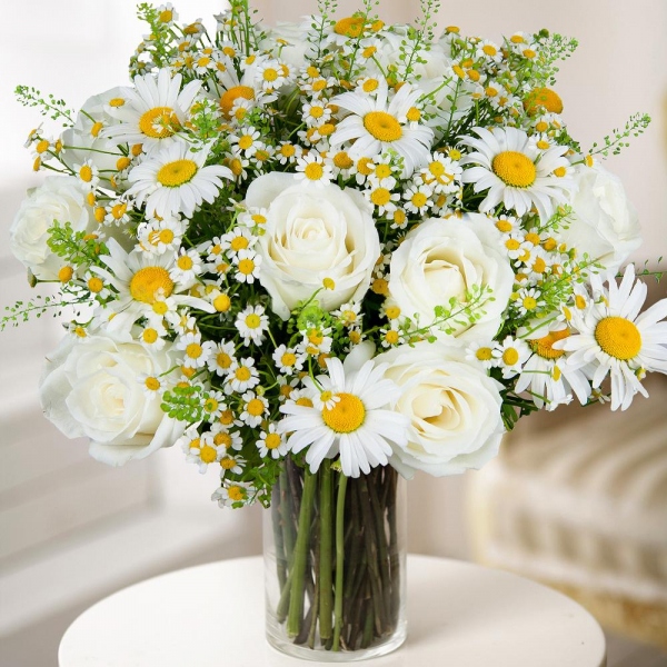 Chamomile - 27, White rose 50 cm - 17, Bacardi White Spray Chrysanthemum - 5, Green bell (1 pc.), Wrapping Paper, Ladybug decorative, 1 pc.
