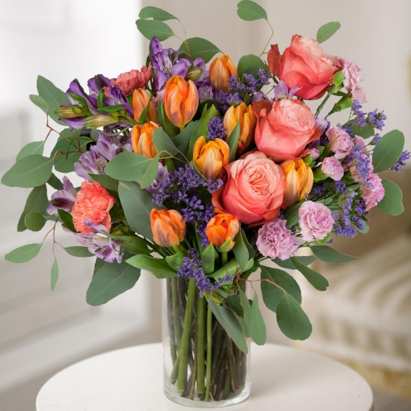 Alstromeria lilac, purple - 6, Orange tulip - 15, Pink spray carnation - 5, Orange carnation - 4, Peony rose Kahala 50 cm - 5, Limonium (1 pc.), Eucalyptus populus (1 pc.), Wrapping Paper, Ribbon