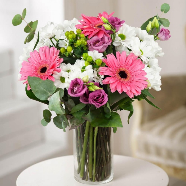 Gerbera pink - 4, Bacardi White Spray Chrysanthemum - 5, Purple Lisianthus (Eustoma) - 4, Hypericum, Eucalyptus Cinerea, Wrapping Paper