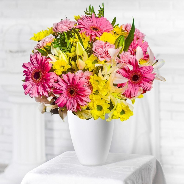 Gerbera pink - 9, Pink carnation - 10, Lilies - 5, Bacardi Yellow Spray Chrysanthemum - 8, Pistachio, Mesh (Abaka), Ribbon
