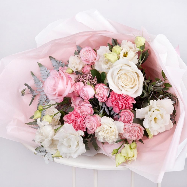 Pink rose 50 cm - 2, White rose 50 cm - 3, Bright pink spray rose mix, 50 cm - 3, Carnation white, cream - 4, lisianthus - 4, Pink carnation - 3, Ozotamnus, Pistachio, Fern (1 pc.), Wrapping Paper