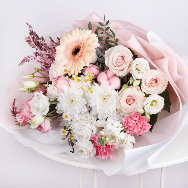 Baltica White Spray Chrysanthemum - 2, Cream gerbera - 3, Peony sprayrose - 3, Chamomile - 1, Pink rose 50 cm - 3, Pink carnation - 3, lisianthus - 2, White Matthiola - 2, Pistachio, Cotton bud, Fern (1 pc.), Dried flowers decor, Wrapping Paper