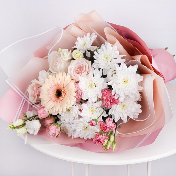 Gerbera pink - 1, Baltica White Spray Chrysanthemum - 2, Spray rose: white, cream, light pink 50 cm - 3, Pink spray carnation - 2, lisianthus - 1, Rose Cream 50 cm - 4, Wrapping Paper