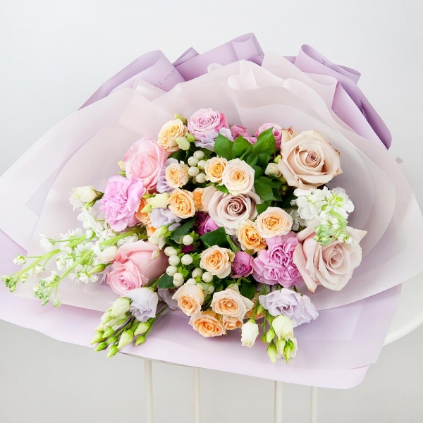 Pink rose 50 cm - 5, Rose Powder 50 cm Ecuador (Quicksand, Menta) - 4, Spray rose: white, cream, light pink 50 cm - 3, Purple Lisianthus (Eustoma) - 3, White Matthiola - 3, Pink carnation - 7, Hypericum, Wrapping Paper