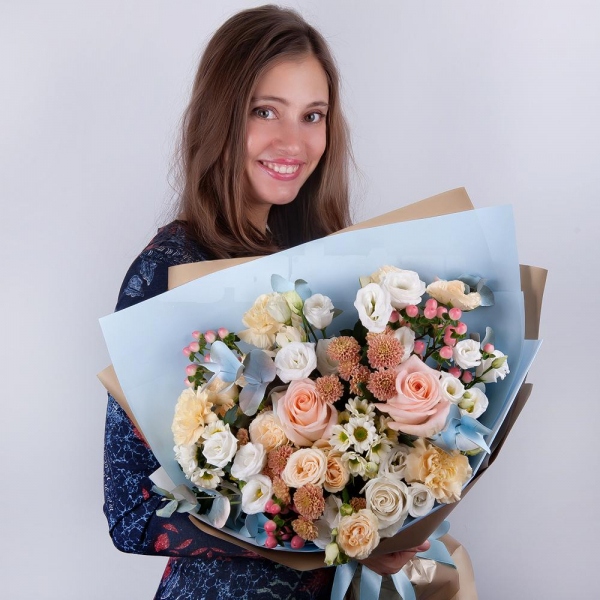 White rose 50 cm - 2, Rose Cream 50 cm - 3, Spray rose: white, cream, light pink 50 cm - 3, lisianthus - 4, Carnation white, cream - 4, Daisy poms Santini pink, purple - 3, Santini White Spray Chrysanthemum - 3, Hypericum, Eucalyptus Cinerea, Wrapping Paper