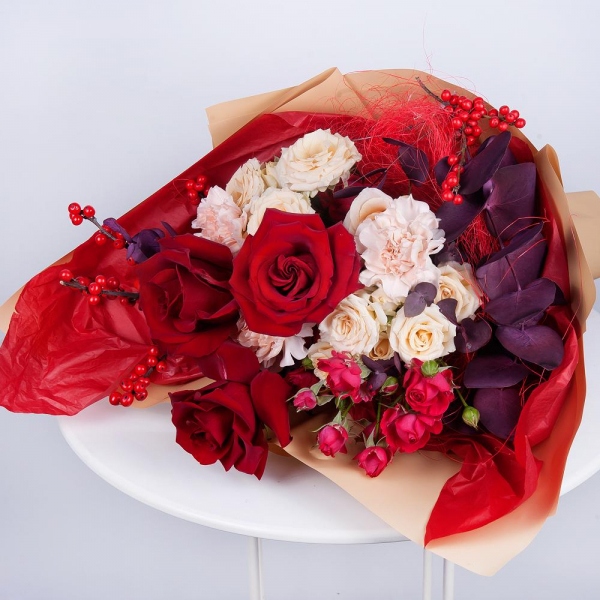 Spray rose: white, cream, light pink 50 cm - 3, Red rose 50 cm - 5, Carnation white, cream - 5, Spray rose: red 50 cm - 3, Eucalyptus Cinerea, Ilex, Wrapping Paper, Sisal