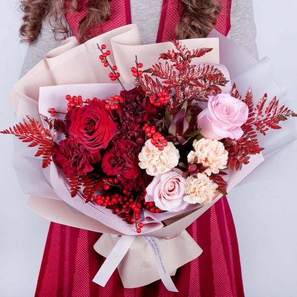 Red rose 50 cm - 2, Pink rose 50 cm - 3, Carnation red - 7, Carnation white, cream - 5, Fern (1 pc.), Ilex, Leukodendron, Wrapping Paper, Ribbon