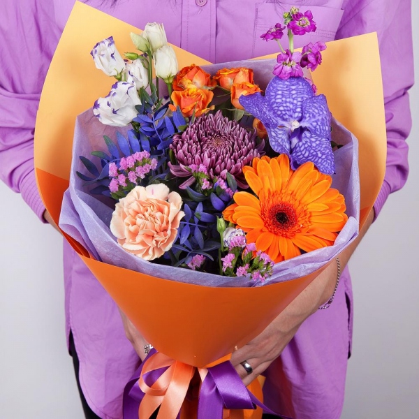 Chrysanthemum Bigoudi purple - 1, Spray rose: yellow, orange 50 cm - 2, Carnation white, cream - 2, Matthiola Lilac - 1, Gerbera daisies - 1, Vanda Orchid bud - 1, Purple Lisianthus (Eustoma) - 2, Flask for orchids, Pistachio, Wrapping Paper, Pink Statice