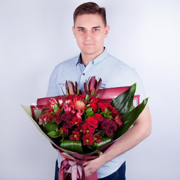 Bacardi Red Spray Chrysanthemum - 4, Red rose 50 cm - 12, Alstromeria Red, Bright Pink - 5, Daisy poms Santini pink, purple - 3, Leukodendron, Aspidistra (1 pc.), Solidago (1 pc.), Wrapping Paper, Ribbon, Ruscus, Nutan