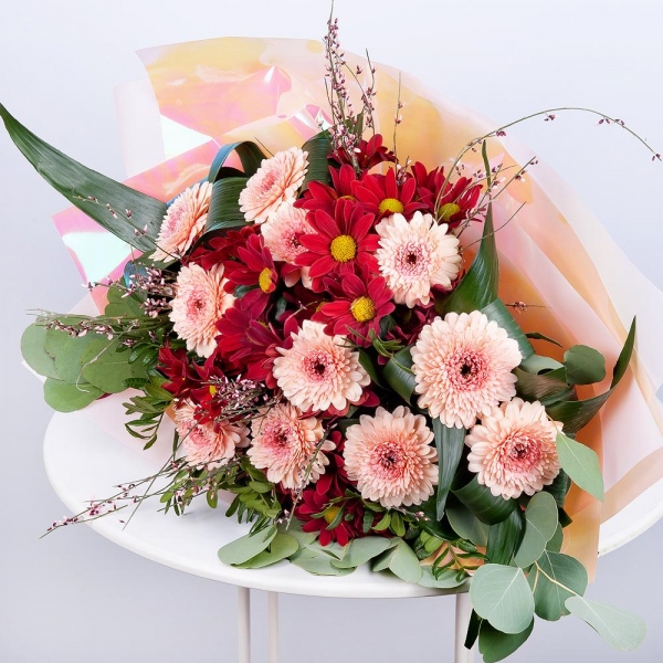 Gerbera pink - 17, Bacardi Red Spray Chrysanthemum - 5, Aspidistra (1 pc.), Eucalyptus Cinerea, Pistachio, Genista, Wrapping Paper, Ribbon