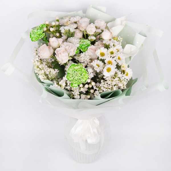 Green carnation - 7, Spray rose: white, cream, light pink 50 cm - 4, Santini White Spray Chrysanthemum - 4, Calla lilies - 2, White Lilac - 3, Hypericum, White statice, Wrapping Paper