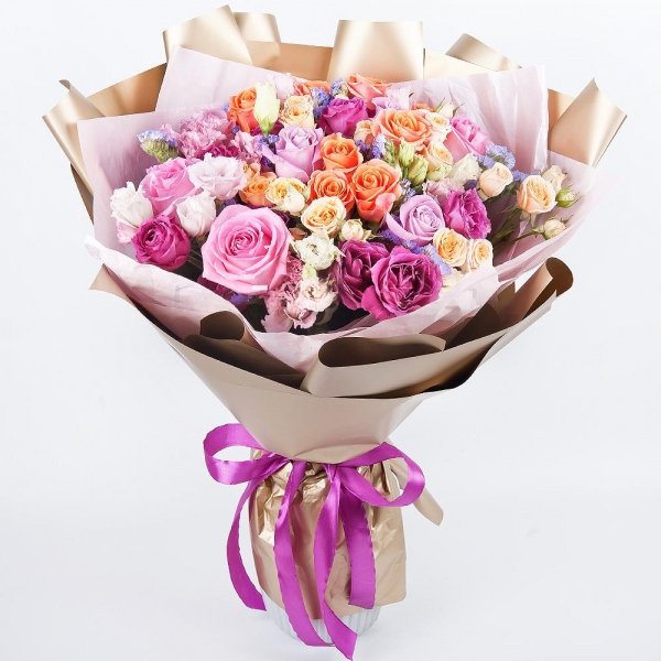 Pink rose 50 cm - 12, Spray rose: yellow, orange 50 cm - 3, Pink Lisianthus (Eustoma) - 4, Spray rose: white, cream, light pink 50 cm - 3, Bright pink spray rose mix, 50 cm - 4, Blue Statice, Wrapping Paper