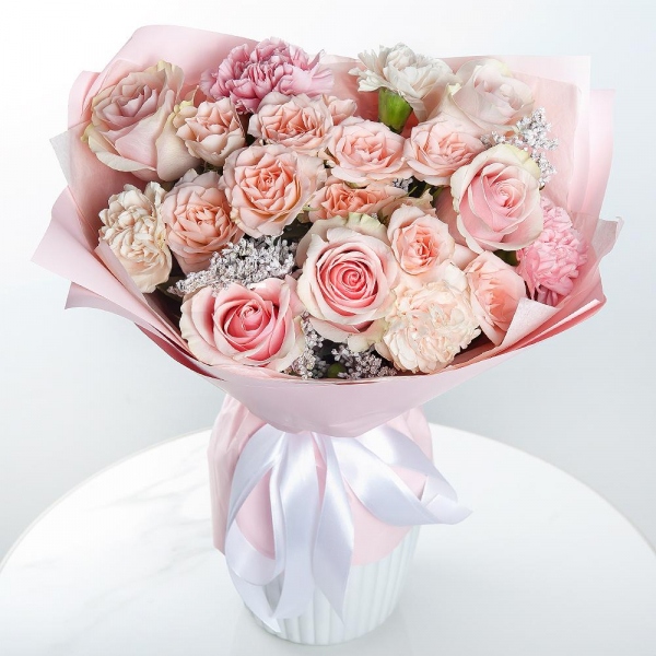 Bright pink spray rose mix, 50 cm - 4, Pink rose 50 cm - 9, Carnation white, cream - 5, Pink carnation - 5, Solidago (1 pc.), Wrapping Paper